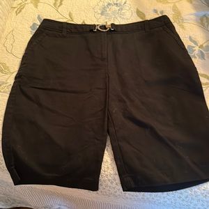 Black Shorts the length is near the knee.